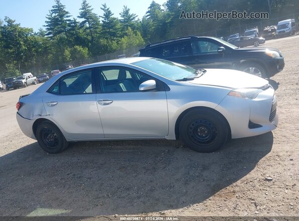 2T1BURHE8JC024796 2018 TOYOTA COROLLA Silver Vista interior trasera