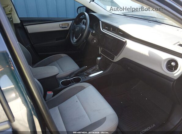 2T1BURHE8JC039041 2018 TOYOTA COROLLA Blue Widok wnętrza z przodu