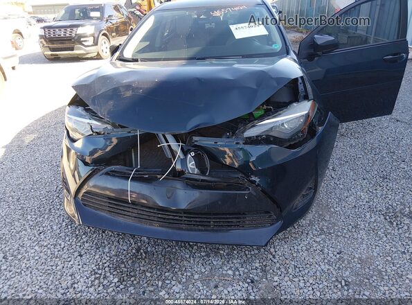 2T1BURHE8JC039041 2018 TOYOTA COROLLA Blue Widok z przodu