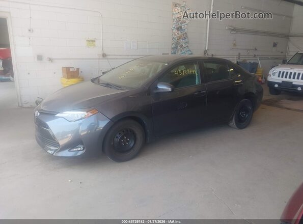 2T1BURHE8JC968050 2018 TOYOTA COROLLA Gray Vista tres cuartos delantera izquierda