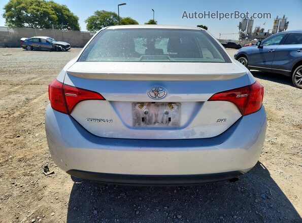 2T1BURHE8KC142526 2019 TOYOTA COROLLA Silver Հետևի տեսք