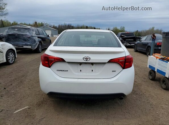 2T1BURHE8KC148665 2019 TOYOTA COROLLA White Widok z tyłu