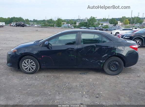 2T1BURHE9HC787114 2017 TOYOTA COROLLA Black Vista interior trasera