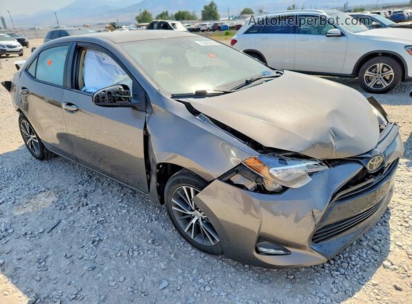 2T1BURHE9HC841981 2017 TOYOTA COROLLA Gray Delantero derecho