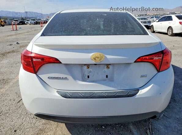 2T1BURHE9HC854827 2017 TOYOTA COROLLA Белый Вид сзади
