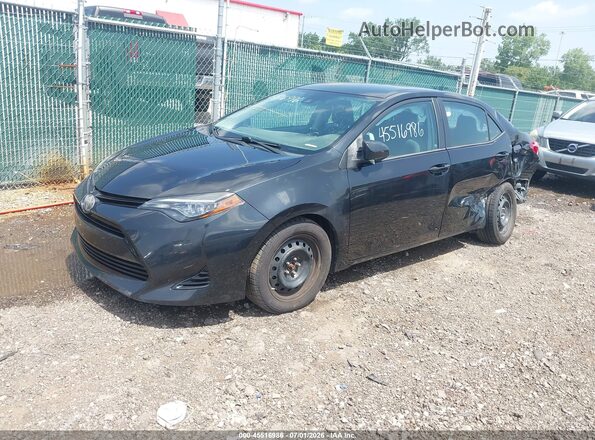 2T1BURHE9HC868758 2017 TOYOTA COROLLA Black Vista tres cuartos delantera izquierda