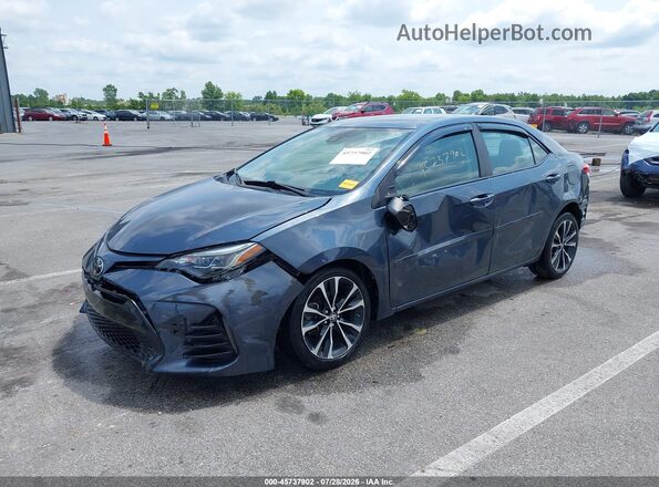 2T1BURHE9HC892171 2017 TOYOTA COROLLA Light Blue Передняя левая четверть