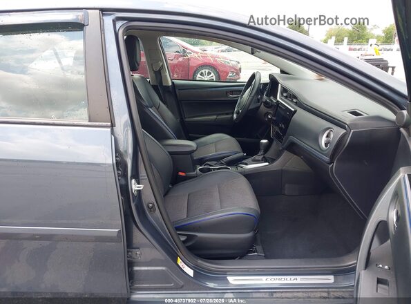 2T1BURHE9HC892171 2017 TOYOTA COROLLA Light Blue Вид салона спереди