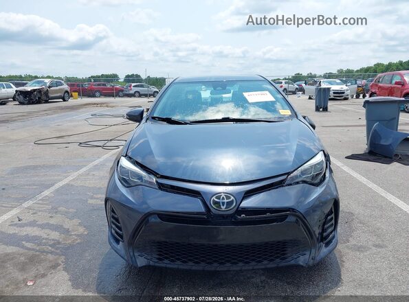 2T1BURHE9HC892171 2017 TOYOTA COROLLA Light Blue Вид задней части салона