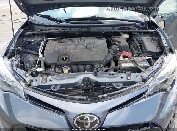2T1BURHE9HC892171 2017 TOYOTA COROLLA Light Blue Вид сзади