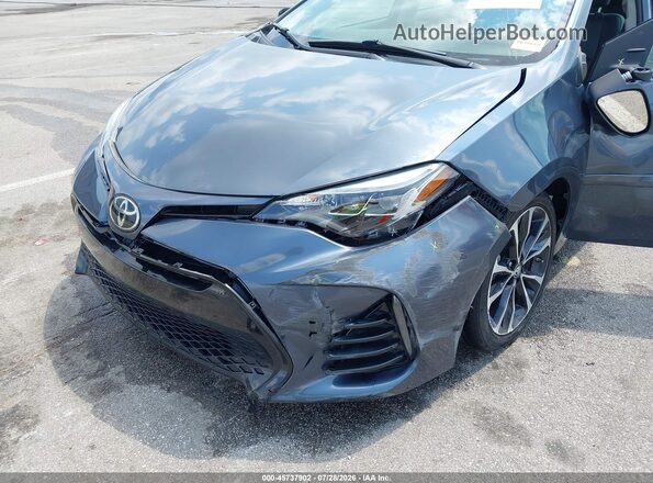 2T1BURHE9HC892171 2017 TOYOTA COROLLA Light Blue Front view