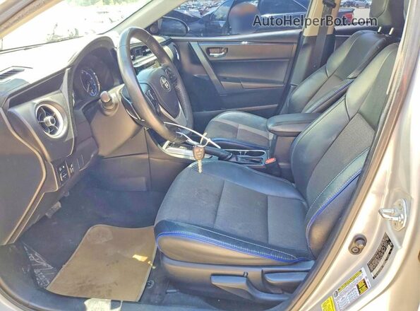 2T1BURHE9HC914167 2017 TOYOTA COROLLA Silver Widok wnętrza z przodu