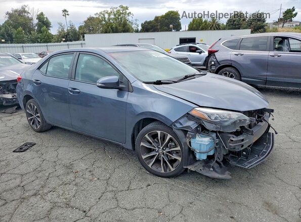 2T1BURHE9JC025312 2018 TOYOTA COROLLA Blue Front right