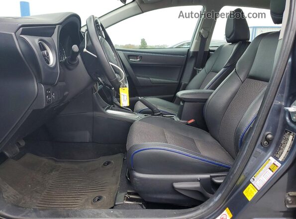 2T1BURHE9JC025312 2018 TOYOTA COROLLA Blue Front interior view