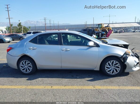 2T1BURHE9JC037783 2018 TOYOTA COROLLA Silver Widok wnętrza z tyłu