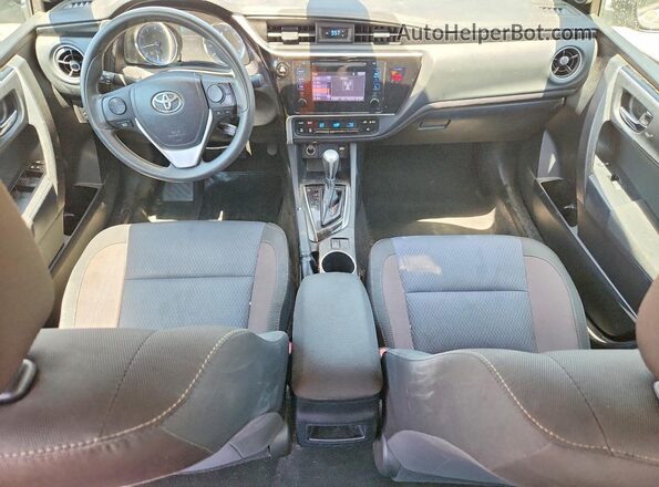2T1BURHE9JC050520 2018 TOYOTA COROLLA Silver Dashboard view