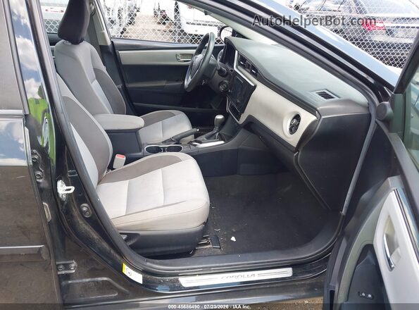 2T1BURHE9JC058634 2018 TOYOTA COROLLA Черный Вид салона спереди