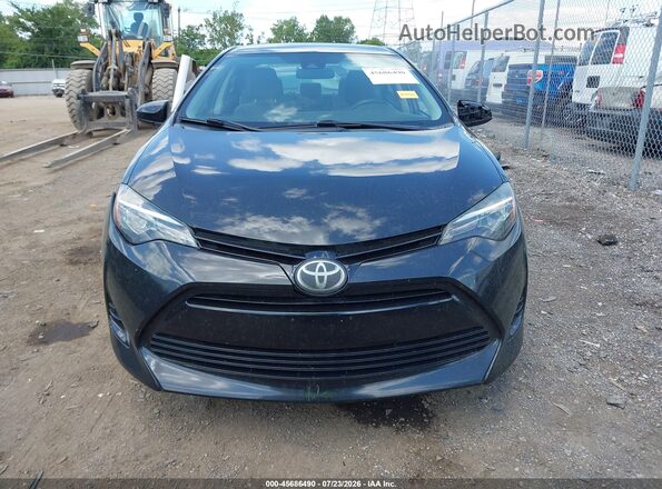 2T1BURHE9JC058634 2018 TOYOTA COROLLA Черный Вид задней части салона