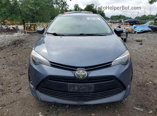 2T1BURHE9JC086689 2018 TOYOTA COROLLA Blue Widok z przodu