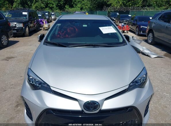 2T1BURHE9JC965397 2018 TOYOTA COROLLA Silver Вид задньої частини салону