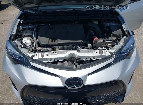 2T1BURHE9JC965397 2018 TOYOTA COROLLA Silver Вид ззаду