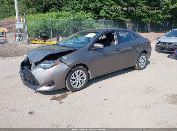 2T1BURHE9KC148495 2019 TOYOTA COROLLA Серый Передняя левая четверть
