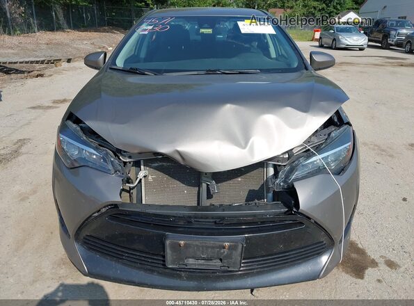 2T1BURHE9KC148495 2019 TOYOTA COROLLA Серый Вид спереди