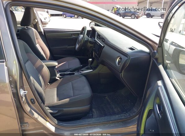 2T1BURHE9KC148495 2019 TOYOTA COROLLA Серый Вид салона спереди