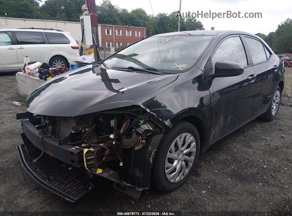 2T1BURHE9KC232705 2019 TOYOTA COROLLA Black Vista tres cuartos delantera izquierda