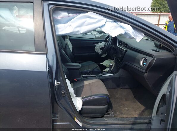 2T1BURHEXHC769950 2017 TOYOTA COROLLA Blue Front interior view
