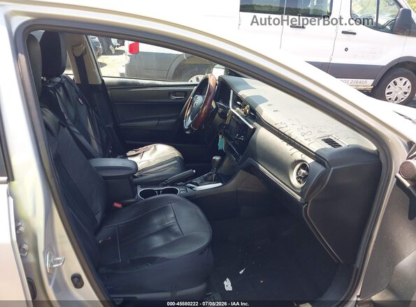 2T1BURHEXKC197222 2019 TOYOTA COROLLA Серебряный Вид салона спереди
