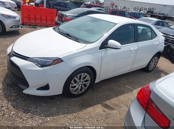 2T1BURHEXKC225102 2019 TOYOTA COROLLA White წინა მარცხენა ხედი სამი მეოთხედიდან