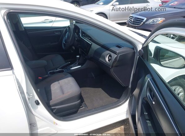 2T1BURHEXKC225102 2019 TOYOTA COROLLA White წინა სალონის ხედი