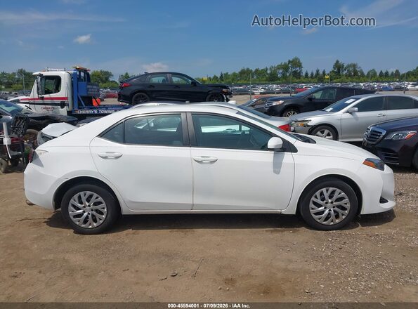 2T1BURHEXKC225102 2019 TOYOTA COROLLA White ხელსაწყოთა პანელის ხედი