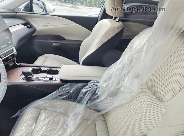2T2BBMCAXSC070060 2025 LEXUS RX Silver Vista del salpicadero
