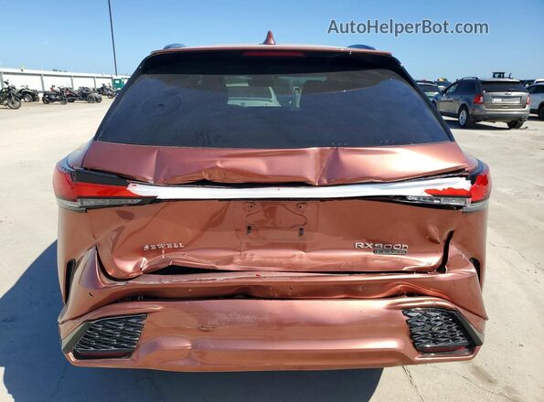 2T2BCMEA0RC010857 2024 LEXUS RX Pink Rear view