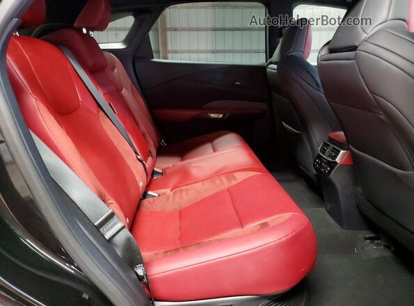 2T2BCMEA4RC010831 2024 LEXUS RX Black Vista interior trasera