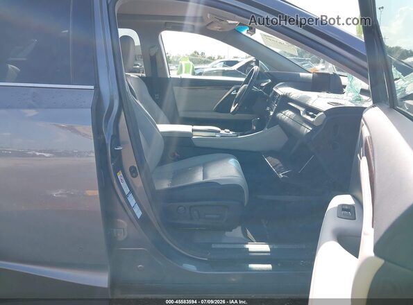 2T2BGMCA4KC033989 2019 LEXUS RX 450H Серый Вид салона спереди
