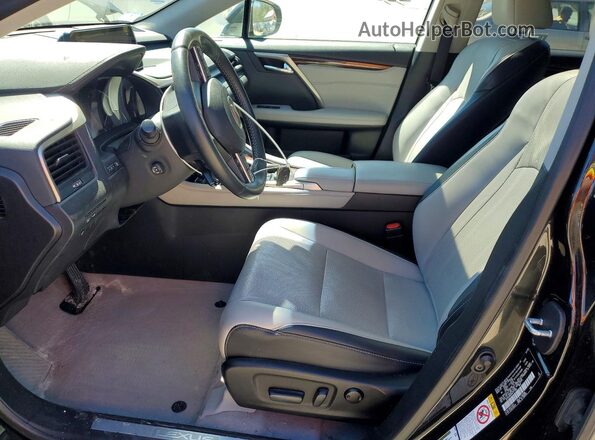 2T2BZMCA0KC171135 2019 LEXUS RX Черный Вид салона спереди