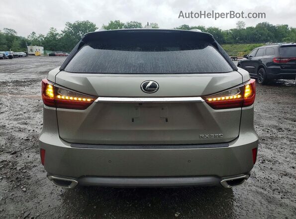 2T2BZMCA1HC088693 2017 LEXUS RX Beige Rear view