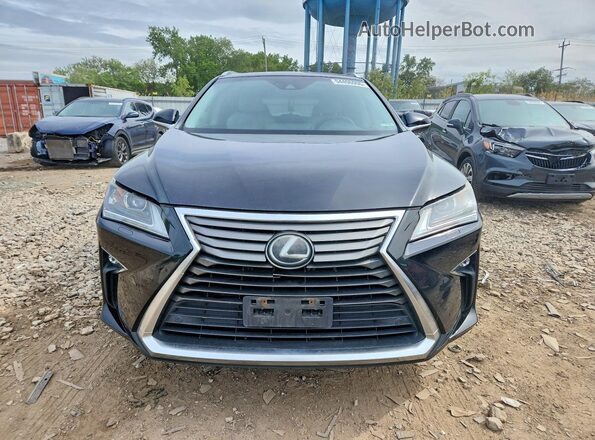 2T2BZMCA2HC089903 2017 LEXUS RX Черный Вид спереди
