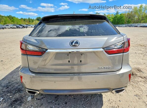 2T2BZMCA2HC116386 2017 LEXUS RX Silver უკანა ხედი