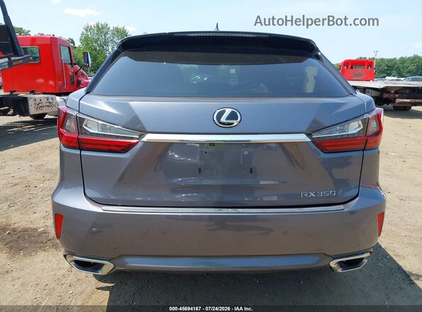 2T2BZMCA2KC174571 2019 LEXUS RX 350 Серый 