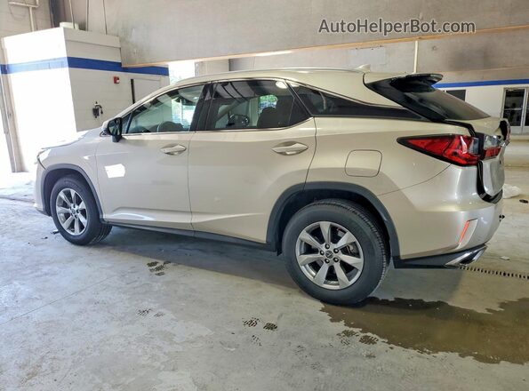 2T2BZMCA3JC152013 2018 LEXUS RX Cream Trasero izquierdo