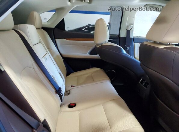 2T2BZMCA3JC152013 2018 LEXUS RX Cream Vista interior trasera