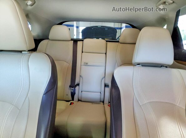 2T2BZMCA3JC152013 2018 LEXUS RX Cream Vista de los asientos traseros