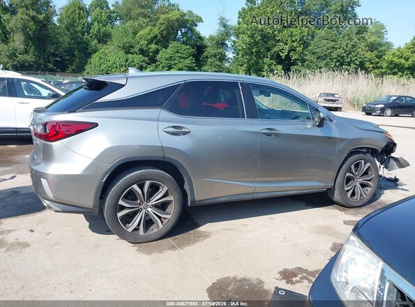 2T2BZMCA3KC185658 2019 LEXUS RX 350 Silver 360 interior view