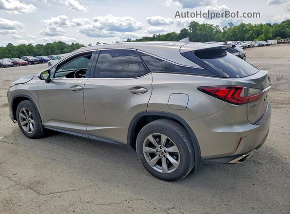 2T2BZMCA4KC209174 2019 LEXUS RX Silver Trasero izquierdo