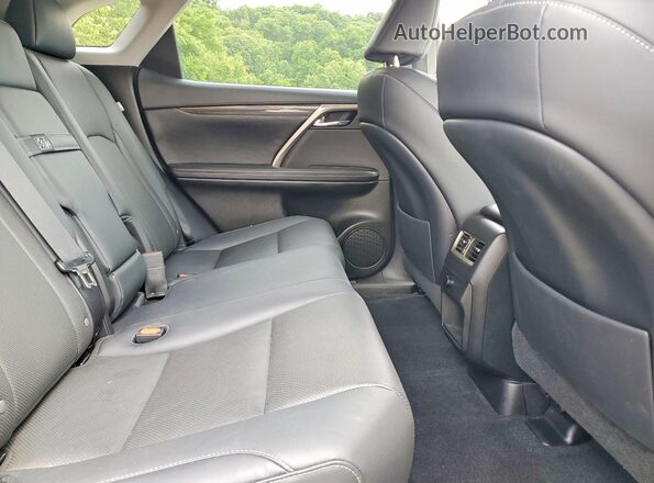 2T2BZMCA4KC209174 2019 LEXUS RX Silver Vista interior trasera