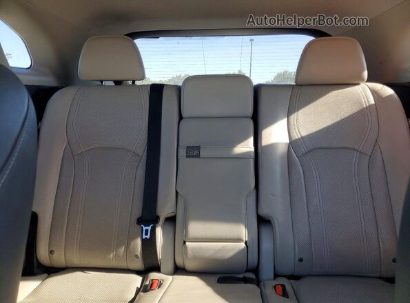 2T2BZMCA5GC017432 2016 LEXUS RX Black Vista de los asientos traseros